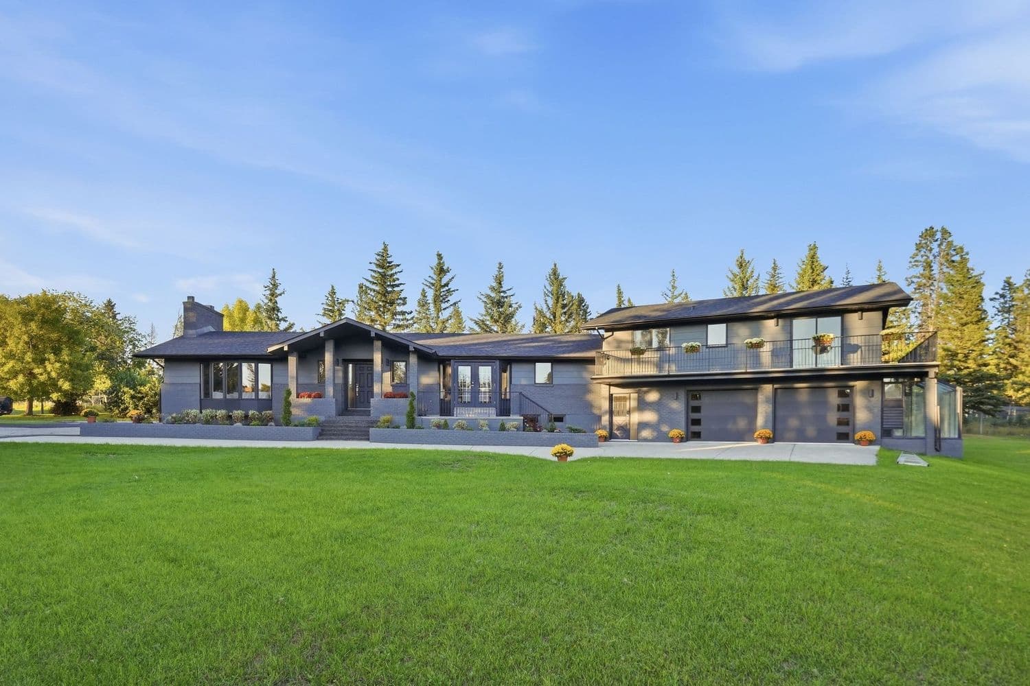 Rear elevation of 1008 Shawnee Drive SW over the manicured lawn