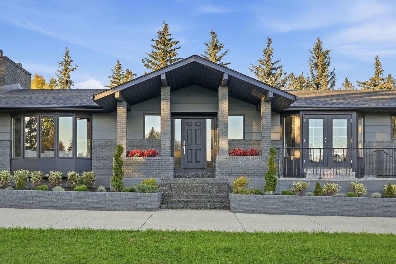 Covered front entrance with stone columns